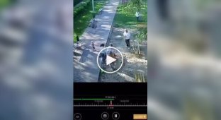 In Russia, two guys beat a father in front of his wife and child