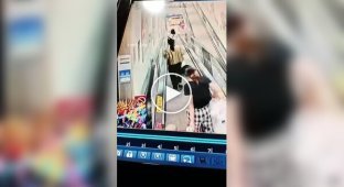 A ride-on car hit a woman and a child on a moving walkway