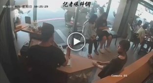 Car crashes into cafe in China