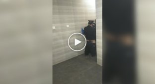 Chinese police in the restroom