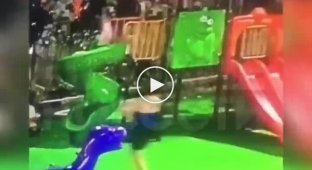 In Vietnam, a boy pushed a girl down a slide