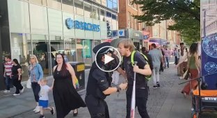 Man detained outside a shop in Britain after buying a baseball bat