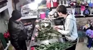 Flower purchase Russian-style: "I'll shoot you right now, hurry up!"