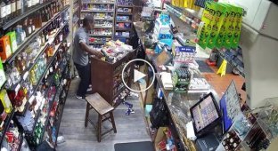 In the US, a man with a pistol was shot in the head by police.