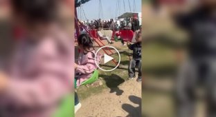 In Kazakhstan, a mother pulled her child off a carousel and injured another
