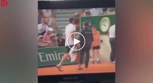 Tennis player pushed a girl serving balls