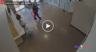 A woman entered a police station with a gun and took a customer hostage