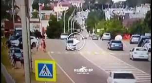 In Russia, a biker hit four people at a crossing