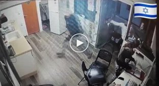 An Arab crashes into a Jewish police station...