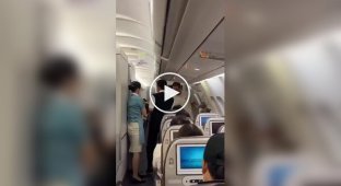 At one of the passengers on board the plane, something went wrong, and he decided to open the door in the cabin