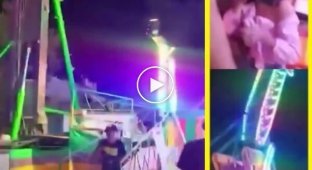 A man caught a girl who fell from an amusement park ride