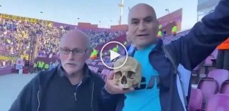 Soccer fan came to the match with a skull