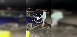 A conflict on the street ended in a car being destroyed