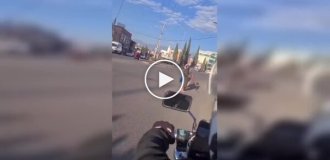 A fire-breathing participant turned a street fight in Mexico into a fire show