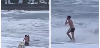 In Russia, a couple in love decided to take a walk along the shore during a storm and the girl was washed into the sea (1 photo + 1 video)