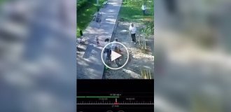 In Russia, two guys beat a father in front of his wife and child