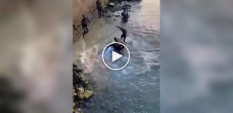 African shaman almost crashed to his death after he wanted to make a spectacular jump into the water