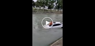 Rescue of a driver from a car that fell into a river