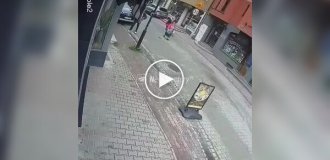 Flashlight falling on Polish woman caught on video
