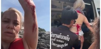 Дівчина дивом вижила після удару об скелі під час шторму у Таїланді (2 фото + 2 відео)