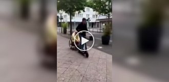 A scooter rider and his wheelchair-bound friend