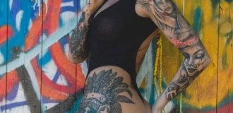 Heavily tattooed girls with appetizing forms