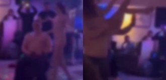 In Russia, a striptease dancer got into character and undressed completely (1 photo + 1 video)