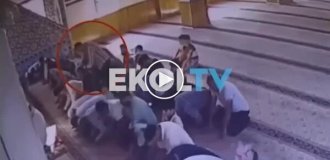 A killer lay in wait for his victim in a Turkish mosque and attacked him from behind during prayer