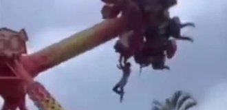 В Индонезии ребёнок сорвался с аттракциона (6 фото + 1 видео)