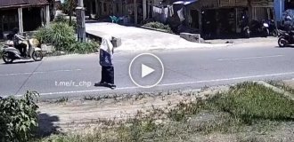 In Indonesia, schoolchildren fell at the feet of a woman.