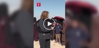 A Turkish TV journalist was pelted with stones during a report