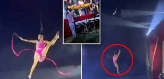Воздушная гимнастка сорвалась с высоты во время номера (4 фото + 1 видео)