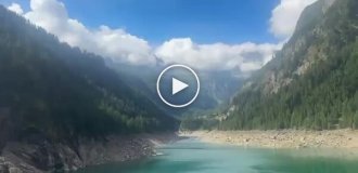 В Италии мужчина снял на видео страшную смерть супруги и брата: вертолет задел лопастями тросы фуникулера и взорвался
