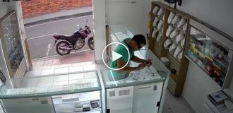 Житель Колумбии оказался меж двух огней во время ограбления