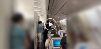 At one of the passengers on board the plane, something went wrong, and he decided to open the door in the cabin