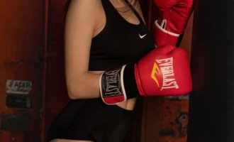A charming brunette challenges you to a sparring match
