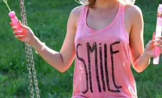 Blonde Lika on a swing