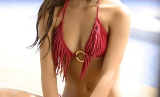 By the sea, by the blue sea... Beauties in bikinis early in the morning