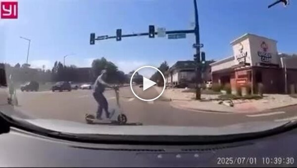 A scooter rider was fined for running a red light