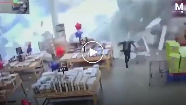 A heavy downpour caused part of a supermarket roof to collapse.