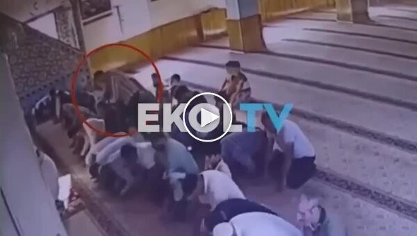 A killer lay in wait for his victim in a Turkish mosque and attacked him from behind during prayer