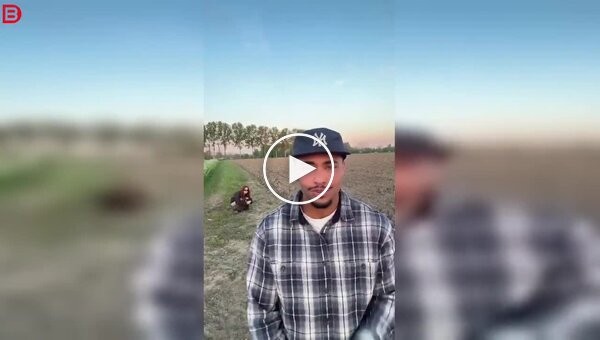 A song on camera and an unexpected background.
