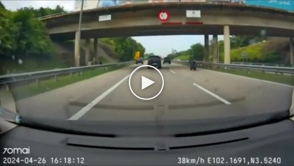 Spectacular ejection of a motorcyclist