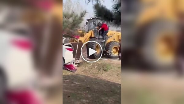 A man with a front-end loader demolished tents with people in them in China.