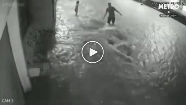 In Brazil 5-year-old girl sucked into manhole during heavy rains