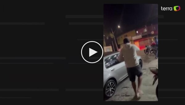 In Brazil, a police car hit a motorcyclist during a chase and crashed into the wall of a building.