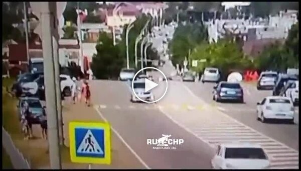 In Russia, a biker hit four people at a crossing