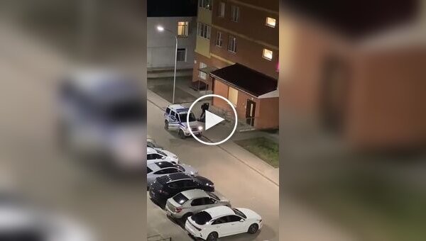 Russian police officers who beat a man and left him lying in a yard in Shatura near Moscow