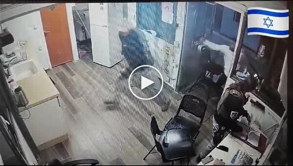 An Arab crashes into a Jewish police station...