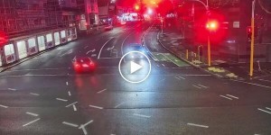 Flew into a parked police car and into a pole